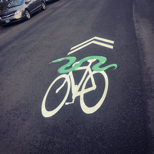 Sharrow with painted snake
