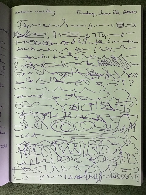 Page of an unlined comp book filled with asemic writing in purple ink
