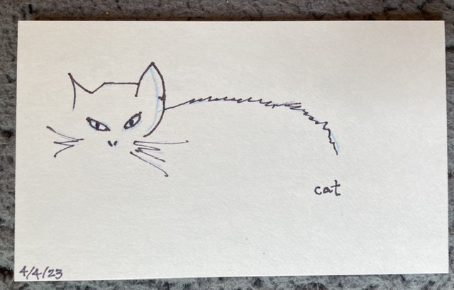 Sketch of a glaring cat, in black marker on a white index card