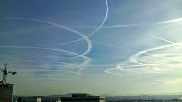 eastern sky from Portland, with contrails in a spiraling pattern